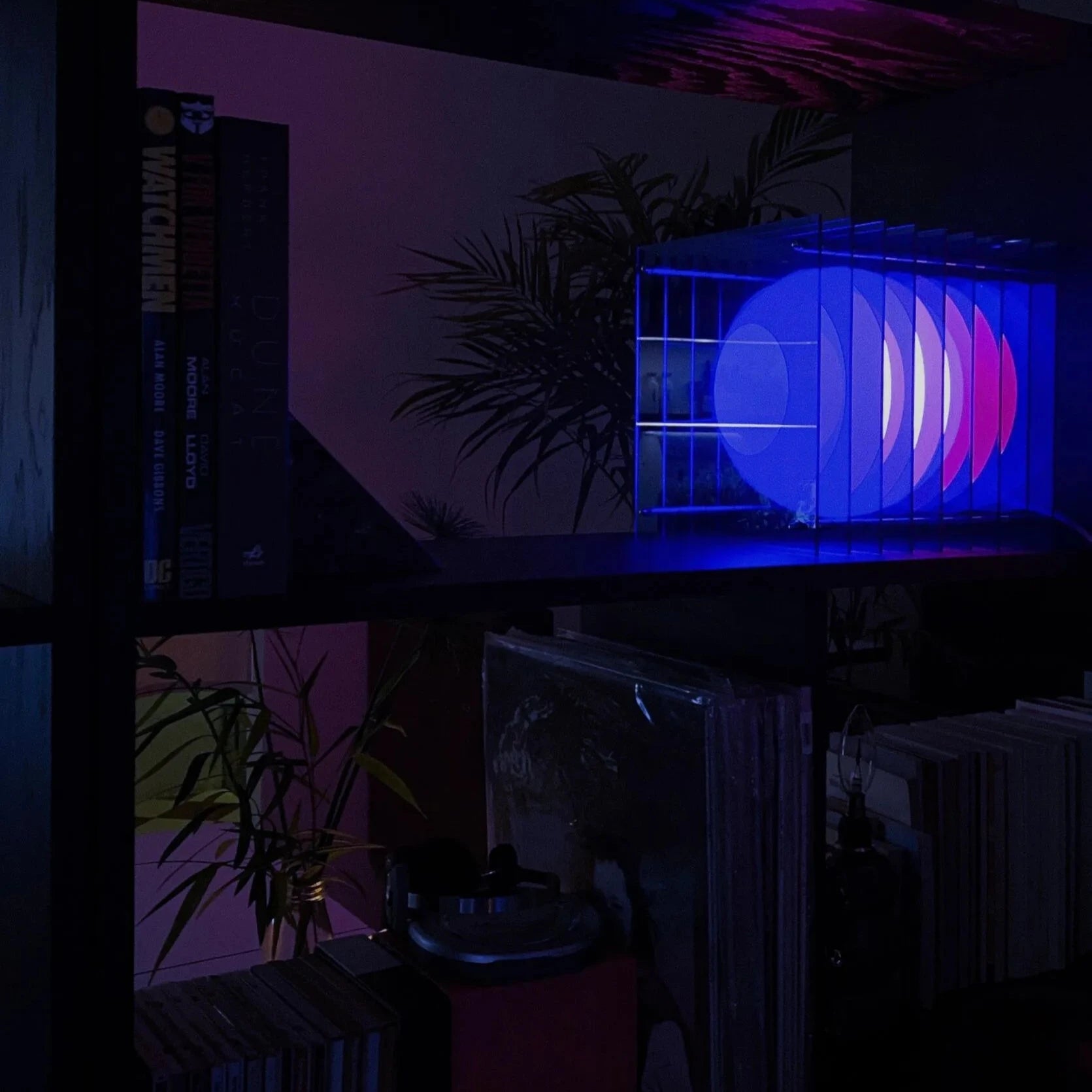 lop small square table lamp in blue on bookshelf