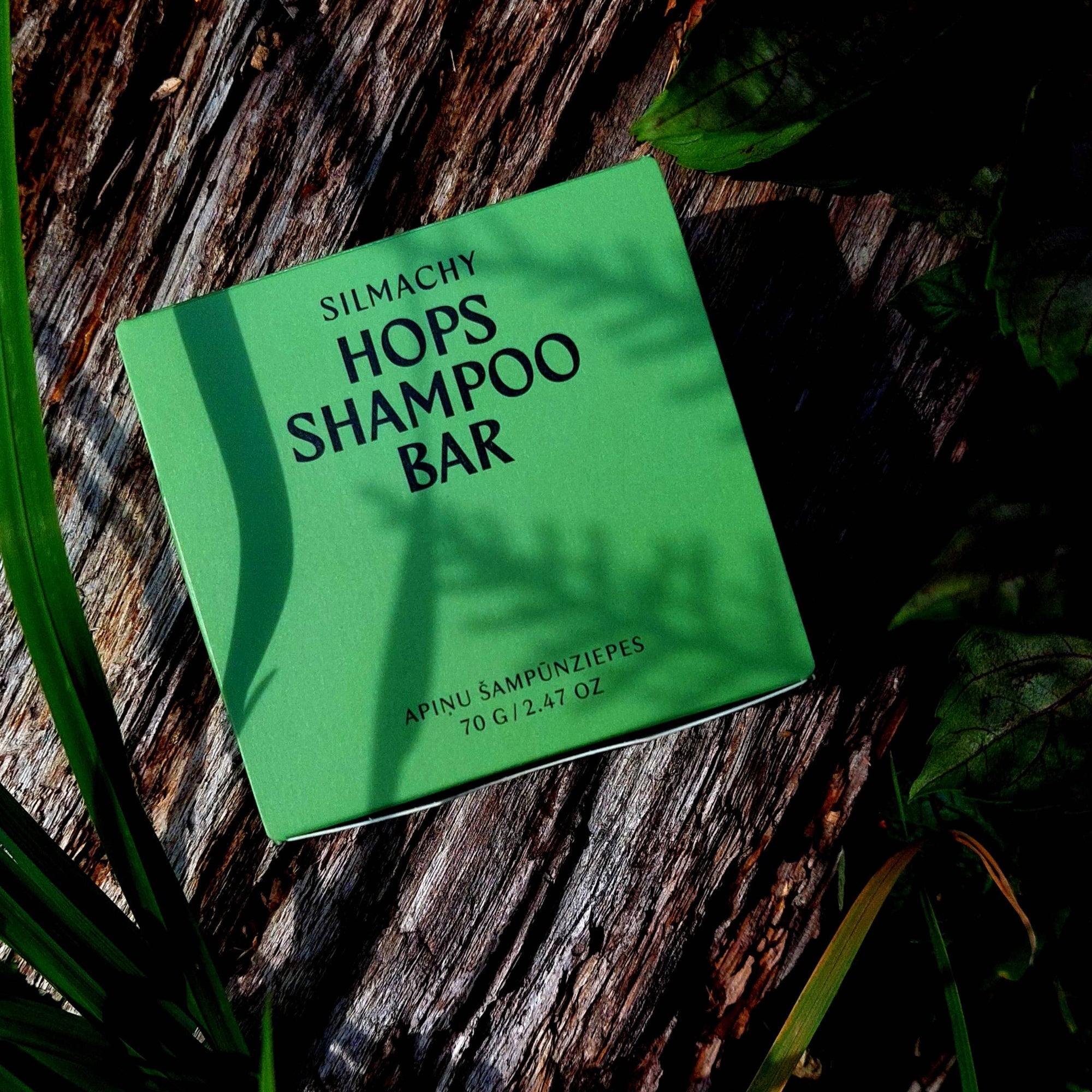 Siemach Hops Shampoo Bar on a wooden surface with greenery