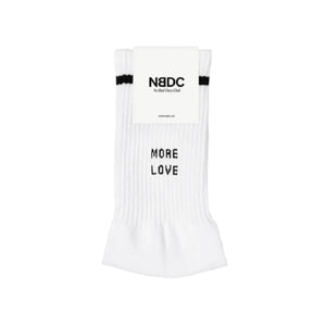 White sock with black text on a light gray background