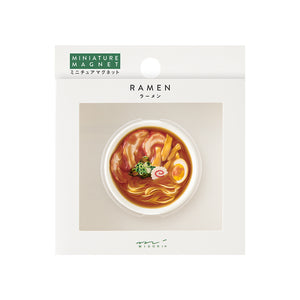 Packaged miniature ramen magnet with branding on a white background