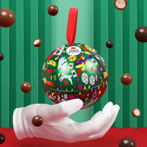 Christmas chocolate in metal ball ornament packaging