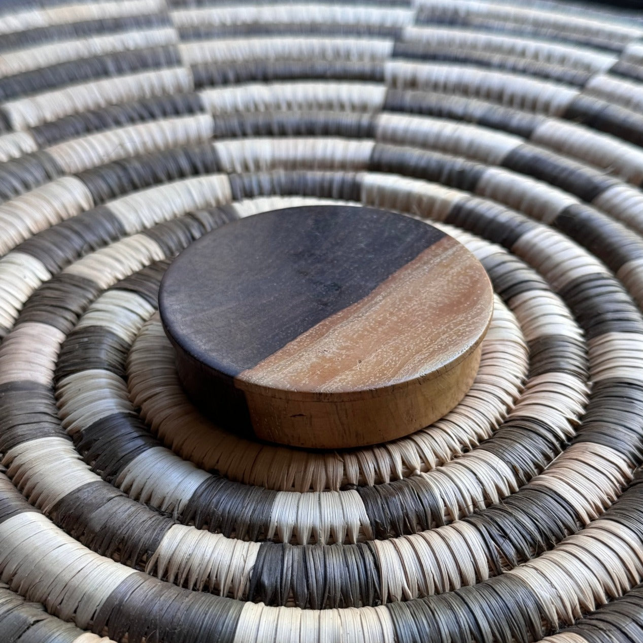 mahogany wood handle basket closeup