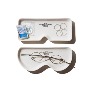 ceramic white plates in the shape of glasses