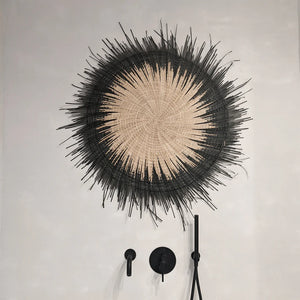 handwoven malawi sun circle in black at material26 berlin