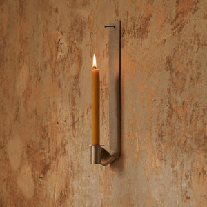 Ornament Candle Holder | Stainless Steel | Long on rustic painted wall