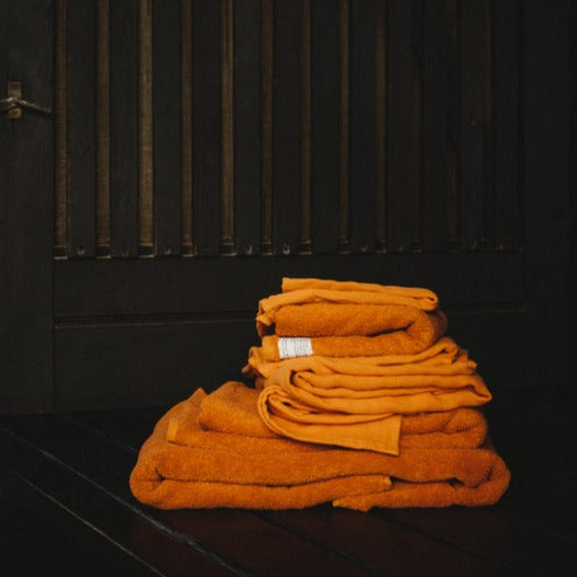 berlin frama heavy towel in burnt orange colour