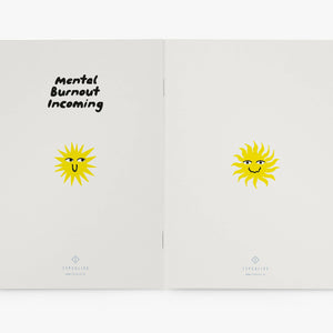 Open notebook with 'Mental Burnout Incoming' text and sun illustrations on a white background