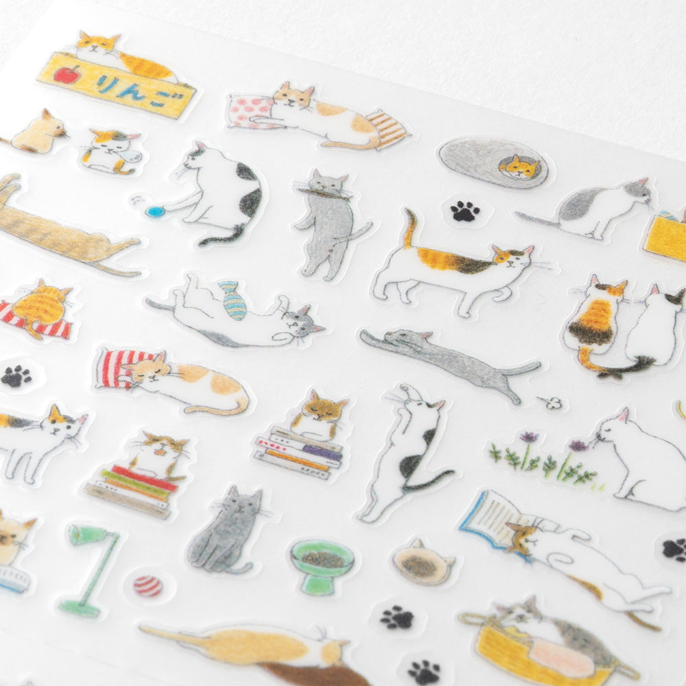 Packaging of a sticker collection with cat illustrations on a white background