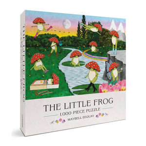 Boxed children's puzzle titled "The Little Frog" with a whimsical illustrated cover showing frogs under red mushrooms in a landscape, plus the text "1,000-piece puzzle" and "Maybell Eeouay.".