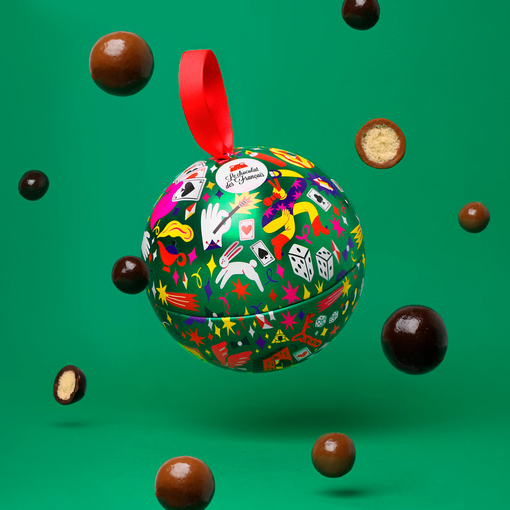 Christmas chocolate in metal ball ornament packaging