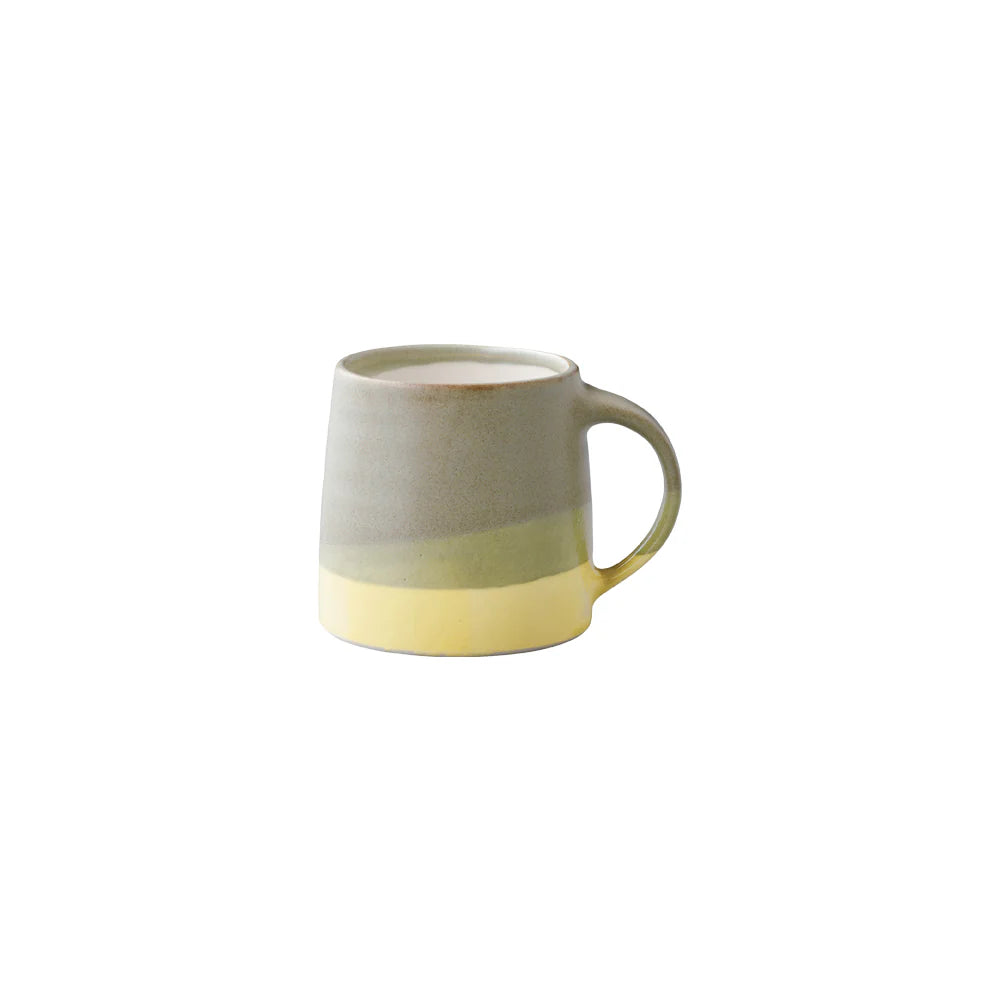 kinto ceramic mug in yellow and green paint strokes
